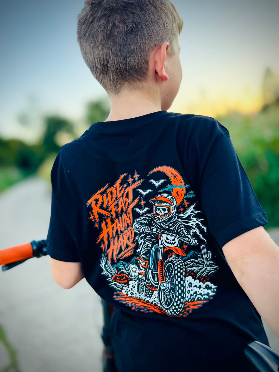 Ride fast haunt hard Halloween Tee